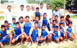 Volleyball players of Panchayat Deoli posing for a group photograph after clinching the title on Thursday.