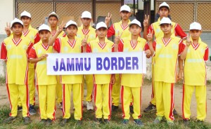 Players of Jammu Border team posing for a group photograph during a match of Gandhi-Mandela Cricket Series on Sunday.