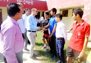 Chief guest interacting with the participants of the Tournament under Rajiv Gandhi Khel Abhiyan at Sunderbani on Monday. 