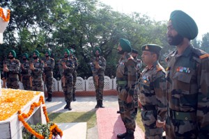 Officers and jawans of Sikh Regiment paying tributes of martyrs of 1965 war at War Memorial in Sunderbani. 