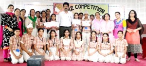 Winners of Quiz Competition posing alongwith School Principal Sanjeev Pardhan and other dignitaries at JK Police Public School in Jammu.