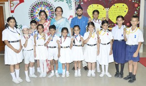 Medal winners in National Kick Boxing Championship posing for a group photograph at BSF School Paloura in Jammu.