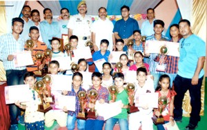 Winners posing for a group photograph during felicitation function organized by  JK Complete Martial Arts Karate-Do Association .