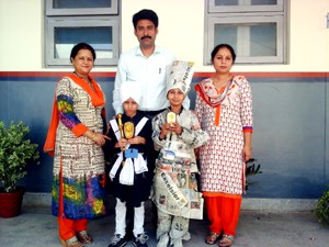 Winners of Fancy Dress Competition posing for a photograph at JK Police Public School in Jammu.