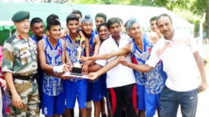 Winners of Basketball Tournament of Army Public School Damana posing for a group photograph on Wednesday.