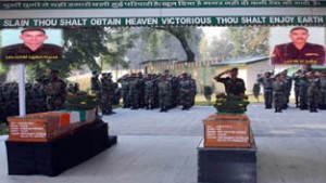 Army personnel paying tributes to Naik Sri Chitra Saikia and Guards Man Jagdish Prasad at Badami Bagh Cantonment in Srinagar on Saturday.