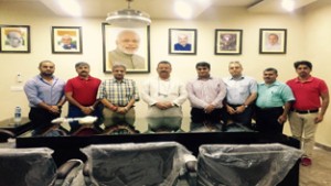 A delegation of PHDCCI posing for photograph with Minister for Industries, Chander Prakash in Jammu on Monday.