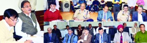 Speaker, Kavinder Gupta chairing a meeting at Srinagar on Tuesday. 