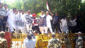 Panthers Party activists protesting near Parliament at New Delhi on Monday.