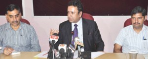 Minister for CAPD Zulfkar Ali addressing press conference in Jammu on Saturday. 