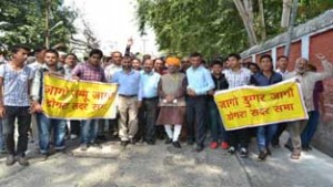 Members of Dogra Sadar Sabha taking out a rally in Jammu city on Saturday.