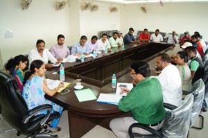 JMC Commissioner Mandeep Kaur interacting with representatives of safai-karamcharis at Jammu on Monday.