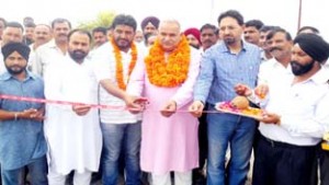 MLA Suchetgarh, Sham Choudhary inaugurating construction work of a road in his constituency.