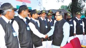 DyCM, Dr Nirmal Singh interacting with participants of National Integration Tour at Srinagar on Wednesday. 