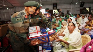 Maj Gen B V Rao felicitating a ‘Veer Naari’ during celebration of 1965 Indo-Pak War Golden Jubilee at Reasi on Monday.