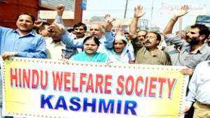  Members of Hindu Welfare Society Kashmir (HWSK) during protest demonstration at Srinagar on Tuesday  -Excelsior/Amin War