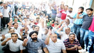 PPEU members raising slogans during protest at Jammu on Tuesday.-Excelsior/Rakesh