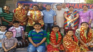 Participants of musical play ‘Doli’ posing for group photograph.