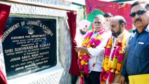 Minister for PHE, Sukhnandan Kumar Choudhary inaugurating WSS in Tral on Wednesday.