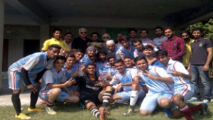 Winners of Inter-Collegiate Football Tournament posing alongwith chief guest and other dignitaries in Jammu on Saturday.