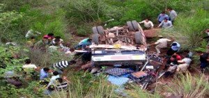 Police and locals trying to rescue victims of accident near Ramnagar on Tuesday.