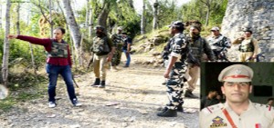 Troops cordon off Gund Dachin area of Bandipora, where a police officer (inset) was killed by militants on Wednesday.