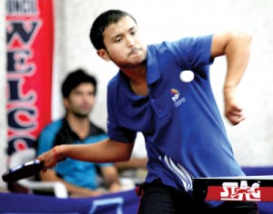 Peddler in action during a match of the Jammu District Table Tennis Championship at Indoor Complex, MA Stadium on Sunday. -Excelsior/ Rakesh 