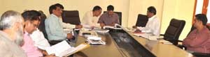 DDC Ramban Bashir Ahmed Dar chairing a meeting at Ramban  on Thursday.