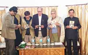 Dignitaries releasing Kashmiri Novel ‘Yotaam Saier Paeth Gow’ at Srinagar on Friday.