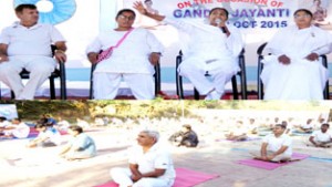 Yoga being performed during Meditation camp in Udhampur.