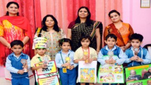 Winners of Show & Tell competition posing for a group photograph at DPS in Jammu on Tuesday.