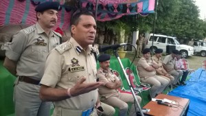 DIG JSK Range Ashkoor Ahmed Wani addressing a gathering at Vijaypur in district Samba on Thursday. 