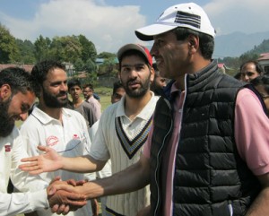 Minister of State for Industries and Commerce, Ashraf Mir interacting with players while inaugurating T20 Cricket Tournament in Srinagar. 