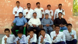 Taekwondo players from HSS Kandhote posing alongwith officers and officials in Jammu.