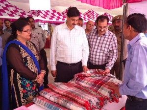 MoS Finance, Pawan Gupta having a look at stall after inaugurating KVIB exhibition at Udhampur on Thursday. 