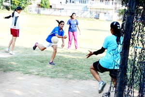 Players in action during a match of Jammu District Handball Championship in Jammu.