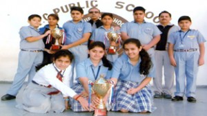 Peddlers of KC Public School posing alongwith Principal Amarendra Kumar Mishra in Jammu on Tuesday.