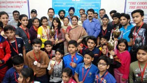 Winners of TT Championship posing alongwith Priya Sethi, Minister of State for Education and other dignitaries in Jammu on Sunday.  