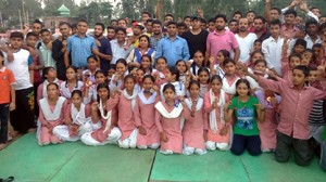 Winners posing for a group photograph during concluding function of Kathua District Judo Championship at District Coaching Centre in Kathua.