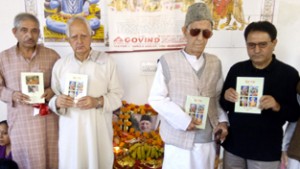 Dignitaries releasing Swami Gopi's 'Prem Rass' Part-II at Durga Nagar in Jammu on Wednesday.