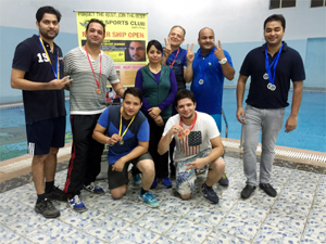 Winners of Swimming Competition posing for group photograph.