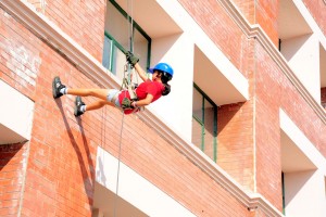 Student displaying climbing skills during Adventure Camp at Heritage School in Jammu.