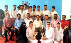 Winners of Table Tennis titles posing alongwith chief guest and other dignitaries in Rajouri on Thursday.