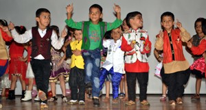 Students performing activity while celebrating 11th Annual Day at Devs Kids World School Kundorian, Katra on Friday.