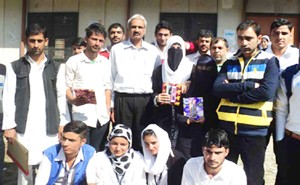 Winners of Quiz Competition Posing for a group photograph alongwith dignitaries at GDC Banihal.  