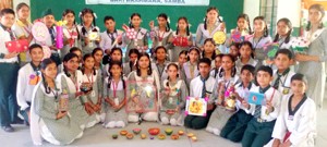 Winners of Art & Craft Competition posing for a group photograph at Humanity Public School on Thursday.