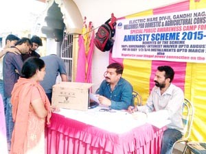 People during Special Awareness Camp organised for PDD’s Amnesty Scheme at Gandhi Nagar on Sunday.