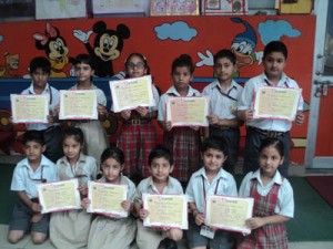 Winners of Poetry Recitation Competition posing for group photograph on Thursday.