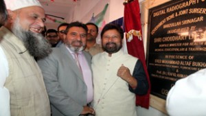 Minister for Health Ch. Lal Singh flanked by Minister for R&B Syed Mohd. Altaf Bukhari inaugurating healthcare facilities at B&J Hospital at Barzulla on Saturday.