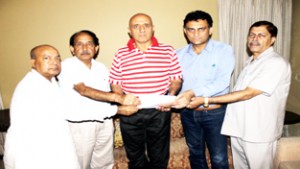Rakesh Wazir alongwith others presenting letter to Parvez Dewan for taking over as Patron-in-Chief of Hotel & Restaurant Association, Katra.